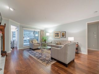 Photo 2: 107 3690 BANFF Court in North Vancouver: Northlands Condo for sale in "Parkgate Manor" : MLS®# R2662089