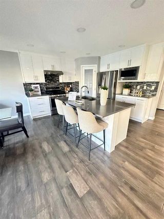 Photo 11: 98 Evansbrooke Park NW in Calgary: Evanston Detached for sale : MLS®# A2124358