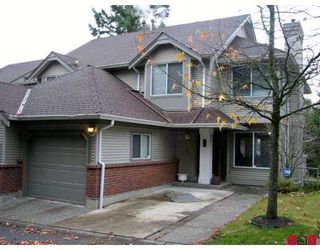 Photo 1: 13900 HYLAND Road in Surrey: East Newton Townhouse for sale in "HYLAND GROVE" : MLS®# F2626438