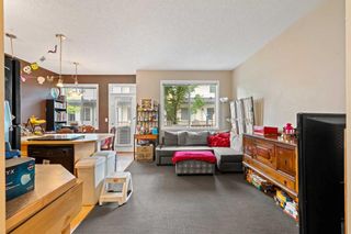 Photo 5: 25 Everridge Gardens SW in Calgary: Evergreen Row/Townhouse for sale : MLS®# A2068646
