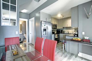 Photo 11: 6 67 West Coach Manor SW in Calgary: West Springs Row/Townhouse for sale : MLS®# A1226623