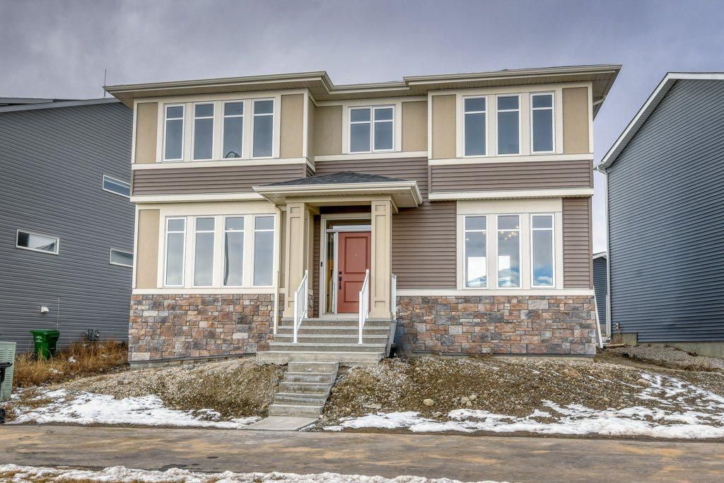 Main Photo: 108 Rowmont Boulevard NW in Calgary: C-483 Detached for sale : MLS®# A2099400