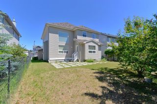 Photo 4: 49 Cougarstone Terrace SW in Calgary: Cougar Ridge Detached for sale : MLS®# A1242065