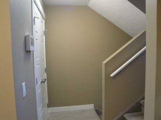 Photo 2: 436 Covecreek Circle NE in Calgary: Coventry Hills Row/Townhouse for sale : MLS®# A2095386