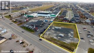 Photo 1: 11145 TECUMSEH ROAD East in Windsor: Vacant Land for sale : MLS®# 22025143