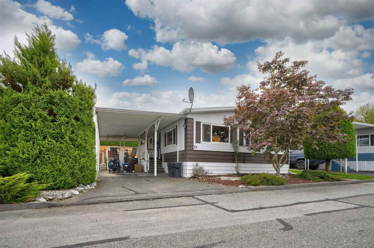 Main Photo: 24 8254 134 Street in Surrey: Queen Mary Park Surrey Manufactured Home for sale in "WESTWOOD ESTATES" : MLS®# R2508251