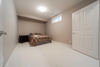Photo 27: 241 Bridle Estates Road SW in Calgary: Bridlewood Semi Detached (Half Duplex) for sale : MLS®# A2091110