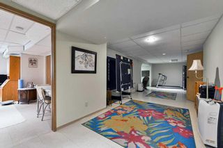 Photo 24: 18 185 Woodridge Drive SW in Calgary: Woodlands Row/Townhouse for sale : MLS®# A2078177