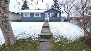 Main Photo: 374 Westwood Drive SW in Calgary: Westgate Detached for sale : MLS®# A2127633