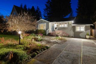 Photo 1: 1446 WOODS Drive in North Vancouver: Capilano NV House for sale : MLS®# R2767977