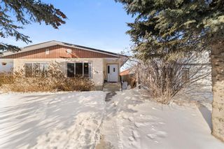 Photo 1: 1628 Saskatchewan Street: Crossfield Semi Detached (Half Duplex) for sale : MLS®# A2032091