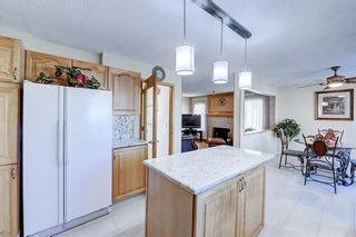 Photo 13: 59 Shawnee Way SW in Calgary: Shawnee Slopes Detached for sale : MLS®# A2028711