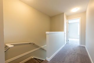 Photo 18: 123 301 REDSTONE Boulevard in Calgary: Redstone Row/Townhouse for sale : MLS®# A1246264