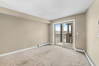 Photo 4: 9404 403 Mackenzie Way SW: Airdrie Apartment for sale : MLS®# A2010407