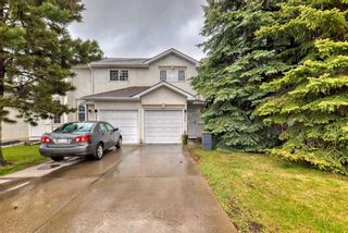 Photo 1: 260 Shawinigan Drive SW in Calgary: Shawnessy Row/Townhouse for sale : MLS®# A2144015