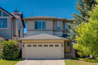 Photo 1: 67 Everstone Drive SW in Calgary: Evergreen Detached for sale : MLS®# A2054862