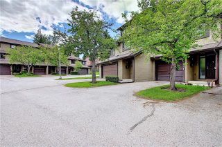 Photo 1:  in Calgary: Glamorgan Row/Townhouse for sale : MLS®# A1077235