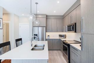 Photo 3: 221 383 Smith Street NW in Calgary: University District Apartment for sale : MLS®# A2128703