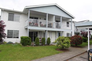 Photo 1: 4 32691 GARIBALDI Drive in Abbotsford: Abbotsford West Townhouse for sale in "Carriage Lane" : MLS®# R2701643