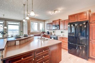 Photo 9: 83 HIDDEN CREEK PT NW in Calgary: Hidden Valley House for sale : MLS®# C4282209