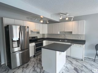 Photo 3: 20048 54A Avenue in Edmonton: Zone 58 House Half Duplex for sale : MLS®# E4380630
