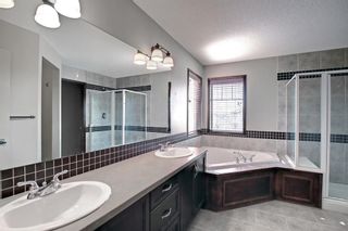 Photo 20: 387 St. Moritz Drive SW in Calgary: Springbank Hill Detached for sale : MLS®# A1185997