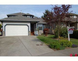 Photo 1: 6828 181ST Street in Surrey: Cloverdale BC House for sale in "Cloverwoods" (Cloverdale)  : MLS®# F2711956