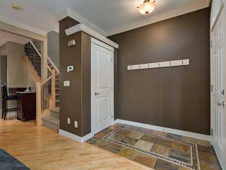 Photo 2: 209 26 AVE NW in CALGARY: Tuxedo Park Residential Attached for sale (Calgary)  : MLS®# C3614703