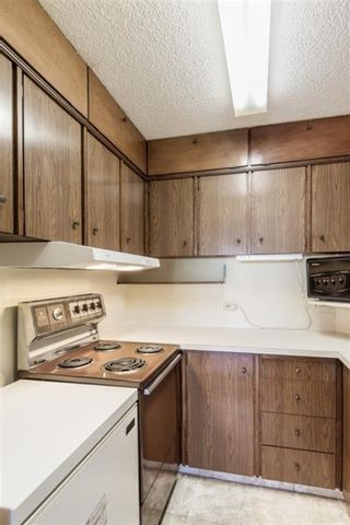Photo 7: 304 324 Cedar Crescent SW Calgary Home For Sale