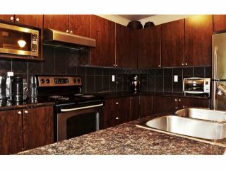 Photo 3: # 67 7518 138TH ST in Surrey: East Newton Condo for sale : MLS®# F1310860