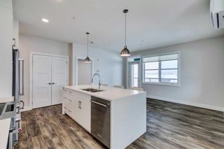 Photo 12: 217 8355 19 Avenue SW in Calgary: Springbank Hill Apartment for sale : MLS®# A2109556