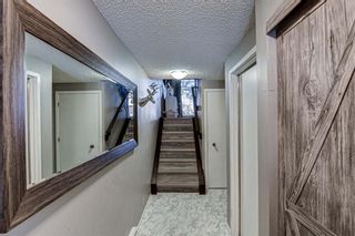 Photo 4: 13 140 Point Drive NW in Calgary: Point McKay Row/Townhouse for sale : MLS®# A1205308