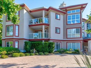 Photo 1: 103 15342 20 Avenue in Surrey: King George Corridor Condo for sale in "STERLING PLACE" (South Surrey White Rock)  : MLS®# R2726042