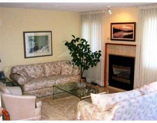 Photo 3: 105 2721 ATLIN PL in Coquitlam: Coquitlam East Townhouse for sale in "THE TERRACES" : MLS®# V549241