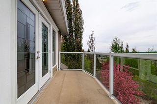 Photo 22: 57 Slopes Point SW in Calgary: Springbank Hill Detached for sale : MLS®# A1226996