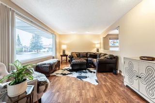Photo 3: 216 Woodpark Place SW in Calgary: Woodlands Detached for sale : MLS®# A1208942