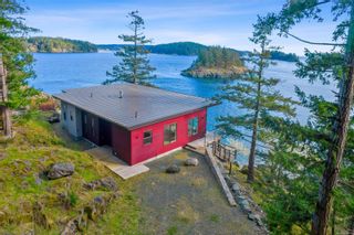 Westcoast contemporary rancher, double garage & private wharf on a stunning oceanfront property at Copper Bluffs!