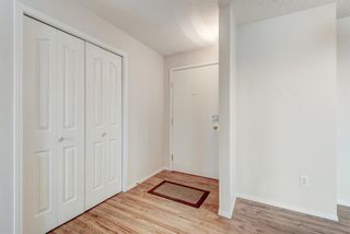 Photo 2: 1306 604 8 Street SW: Airdrie Apartment for sale : MLS®# A1066668