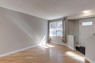 Photo 5: 56 123 Queensland Drive SE in Calgary: Queensland Row/Townhouse for sale : MLS®# A1228124