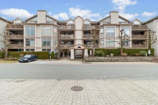 Photo 1: 310 19131 FORD Road in Pitt Meadows: Central Meadows Condo for sale in "WOODFORD MANOR" : MLS®# R2748678