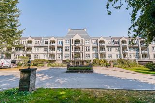 Photo 1: 218 99 BEGIN Street in Coquitlam: Maillardville Condo for sale in "LE CHATEAU I" : MLS®# R2720446