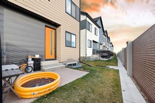 Photo 5: 602 Redstone Crescent NE in Calgary: Redstone Row/Townhouse for sale : MLS®# A2092515
