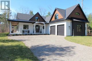 Photo 1: 10206 SANDALWOOD Crescent in Grand Bend: House for sale : MLS®# 40563413