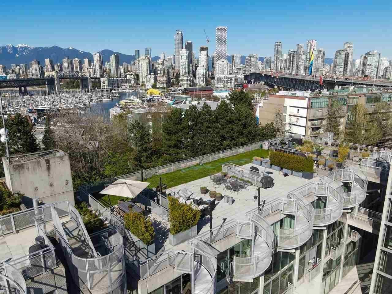 Main Photo: 513 1540 W 2ND Avenue in Vancouver: False Creek Condo for sale in "WATERFALL BUILDING" (Vancouver West)  : MLS®# R2697045