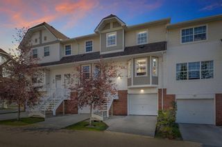 Photo 1: 45 Tuscany Springs Gardens NW in Calgary: Tuscany Row/Townhouse for sale : MLS®# A2081869