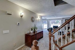 Photo 2: 5 228 Theodore Place NW in Calgary: Thorncliffe Row/Townhouse for sale : MLS®# A2073785