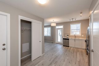 Photo 8: 202 245 Redstone Walk NE in Calgary: Redstone Apartment for sale : MLS®# A1158635