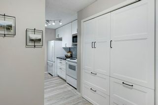Photo 3: 302 33 Arbour Grove Close NW in Calgary: Arbour Lake Apartment for sale : MLS®# A2024734