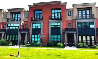 Photo 1: 311 Aspen Meadows Hill SW in Calgary: Aspen Woods Row/Townhouse for sale : MLS®# A2107059
