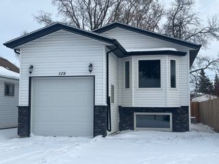 Photo 1: 128 13th St NW in Portage la Prairie: House for sale : MLS®# 202223448